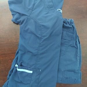 2 sets of Navy Scrubs